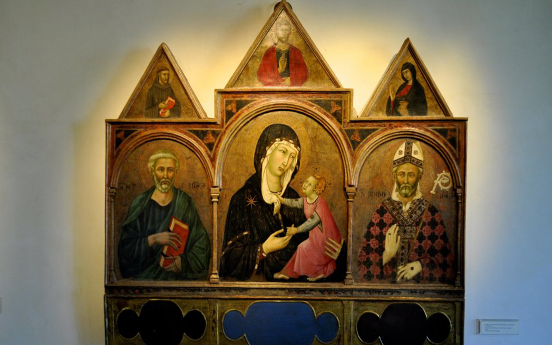 Madonna col bambino tra i santi Pietro e Romolo